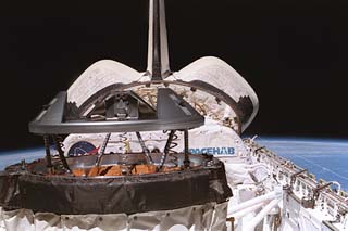 View of the orbiter docking system (ODS) with the docking ring extended after the orbiter's undocking with the Mir space station. 